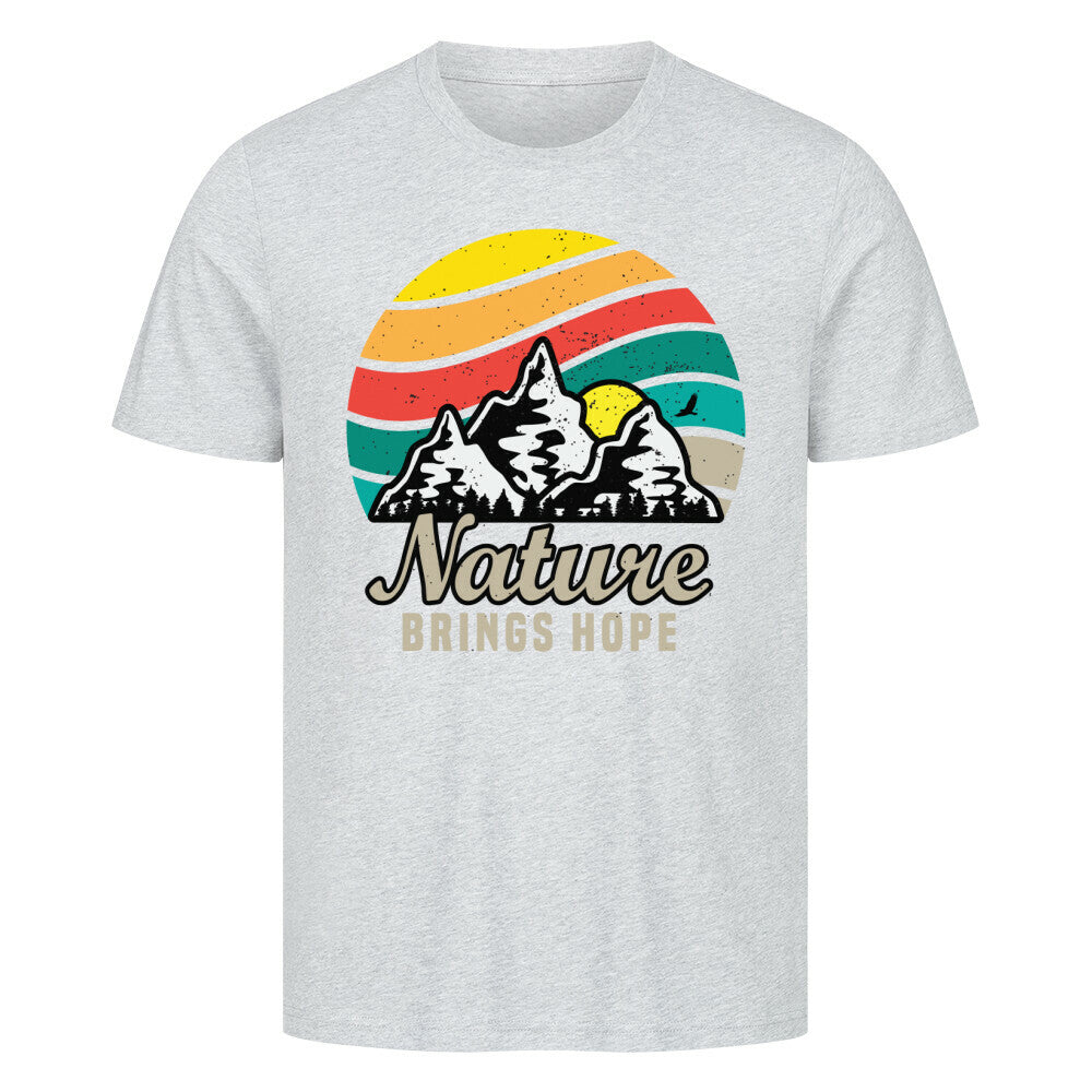 Premium T-Shirt featuring "Nature Brings Hope" design with mountains and sun graphic.
