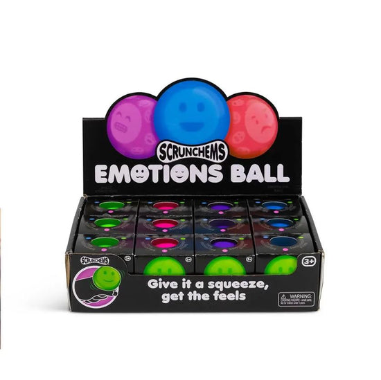 Eine Displaybox mit Emotions Squish Ball-Spielzeugen von www.buyon.at zur sensorischen Stimulation. Die Box enthält neun Reihen mit leuchtenden Stressbällen in Grün, Lila und Pink, die jeweils einzigartige Gesichtsausdrücke zeigen. Auf der Box steht: „Drücken Sie, um die Gefühle zu spüren.“ Geeignet für Kinder ab 3 Jahren.