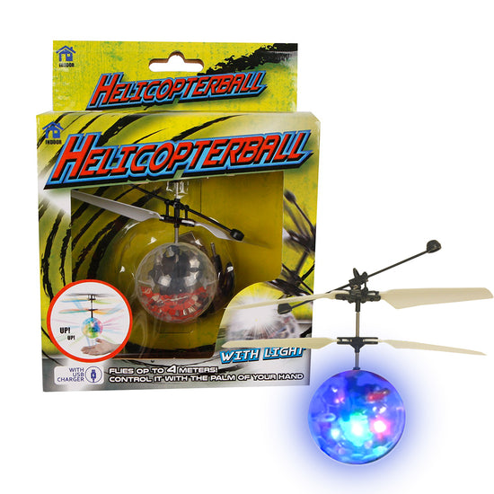 Bild eines „Helicopter Ball mit Licht“-Spielzeugs in seiner Verpackung. Dieses Produkt von www.buyon.at verfügt über Propeller und einen kugelförmigen Körper, der mit bunten LED-Lichteffekten leuchtet. Auf der Verpackung steht, dass es bis zu 4 Meter hoch fliegen kann und mit der Handfläche gesteuert wird, was ein interaktives Flugerlebnis bietet. Inklusive Ladegerät.