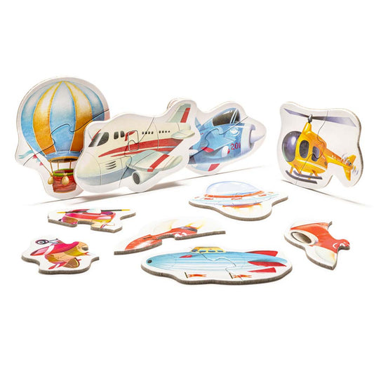 Im Puzzle-Set „Flugzeuge“ von www.buyon.at sind verschiedene bunte Puzzleteile in Fahrzeugform, darunter ein Heißluftballon, Flugzeuge, ein Hubschrauber, ein Raumschiff und ein Auto, aufrecht vor einem weißen Hintergrund angeordnet. Jedes Teil in diesem hochwertigen Puzzle-Set ist aufwendig geschnitten und mit lebendigen Details und Schattierungen illustriert.