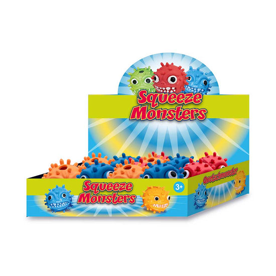 Eine Displaybox mit „Squeeze Monster Face“-Spielzeugen von www.buyon.at enthält farbenfrohe, stachelige Bälle mit Cartoon-Gesichtern. Die überwiegend blau-gelbe Box hebt grüne, rote, blaue und orange Spielzeugbälle hervor. Diese spielerischen, stressreduzierenden Spielzeuge sind ideal für Kinder ab 3 Jahren und bringen Freude in die Spielzeit jedes Kindes.